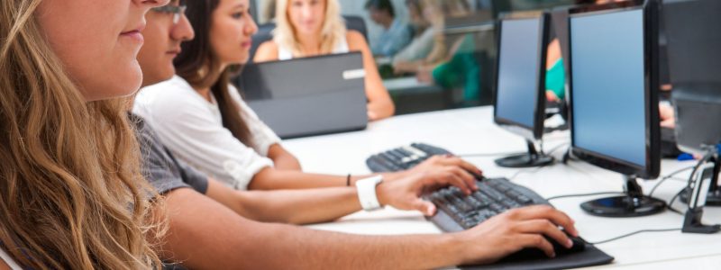 Young people working at computers