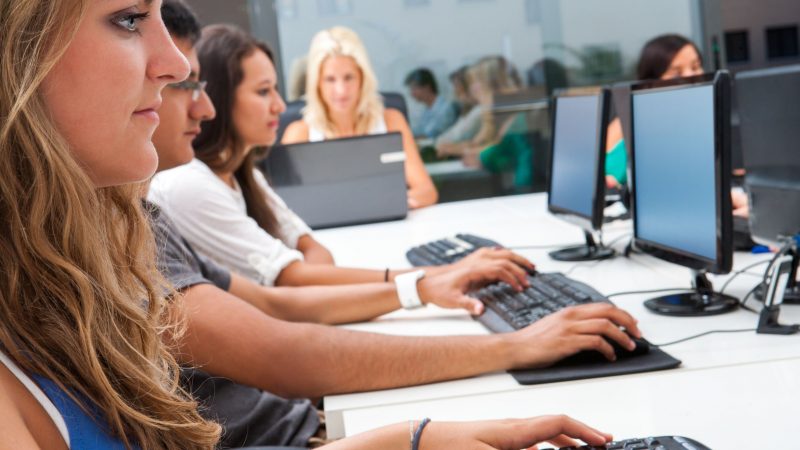 Young people working at computers