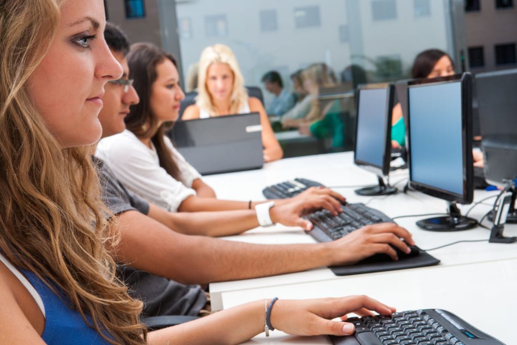 Young people working at computers