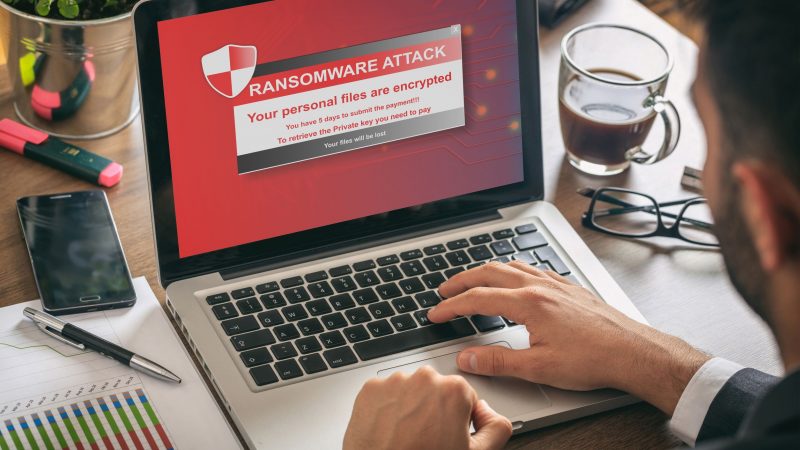 Ransomware alert message on a laptop screen